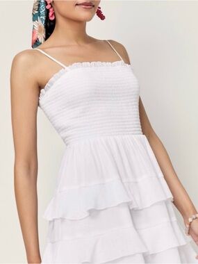 Francesca’s Bridget Smocked Ruffle Tiered Mini Dress Chic white mini dress